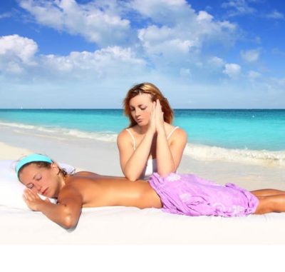 Shiatsu massage course on Sanur Beach with elbows on the back for maximum pressure