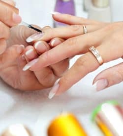 Woman's Nail get a service from professional VTCT Nail Technology