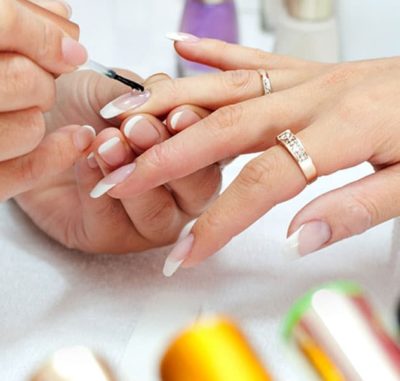 Woman's Nail get a service from professional VTCT Nail Technology
